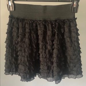 Black ruffle mini skirt